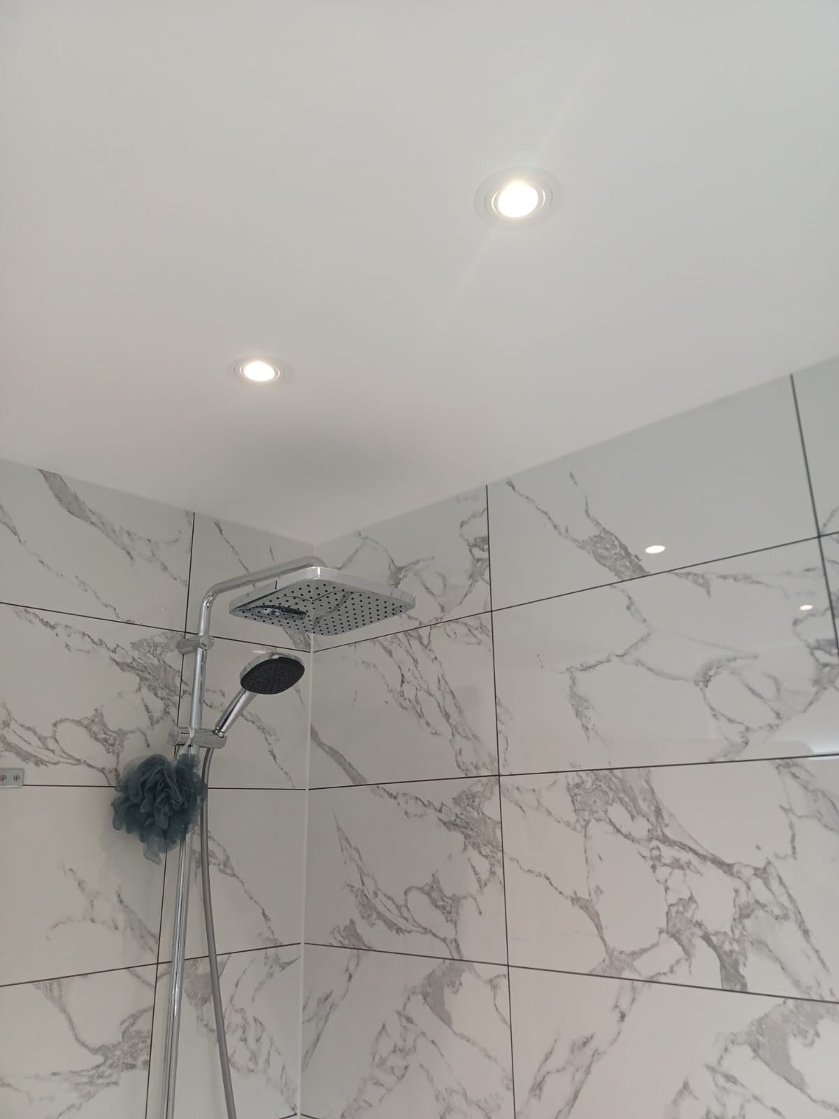 Shower over the bath, with LED downlights