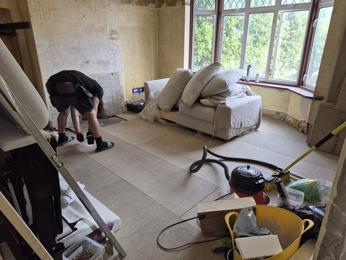 The front room boarded and cleaned up