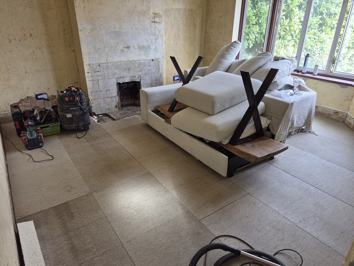 The new subfloor finished across the front room