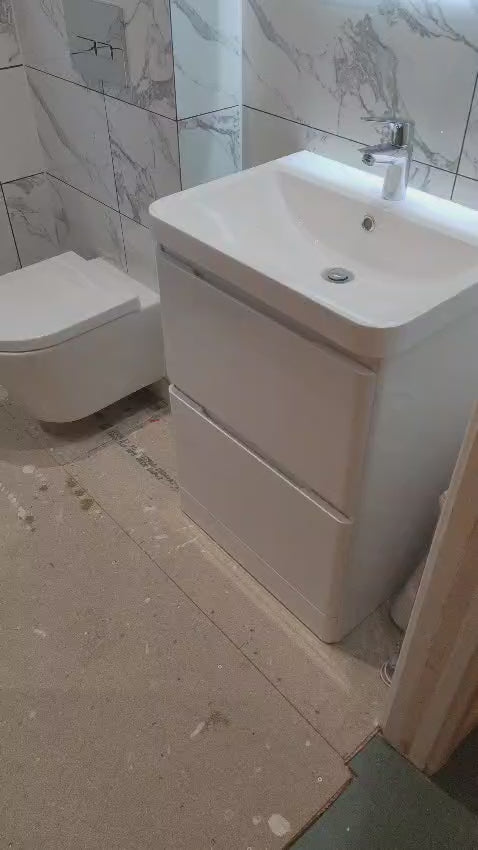 Video walk-round with the vanity unit, backlit mirror and toilet in place