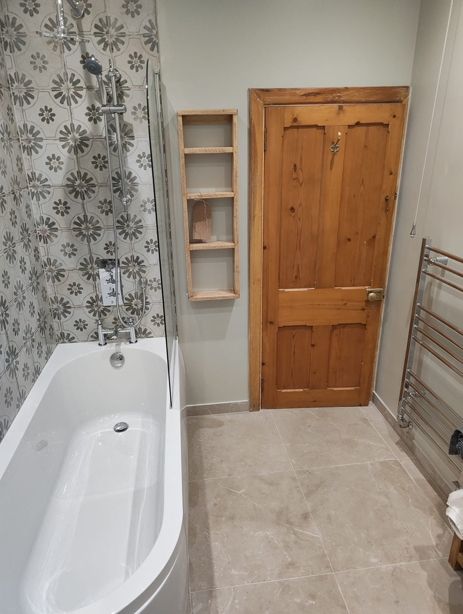 Bath, heated towel rail and the original panelled door