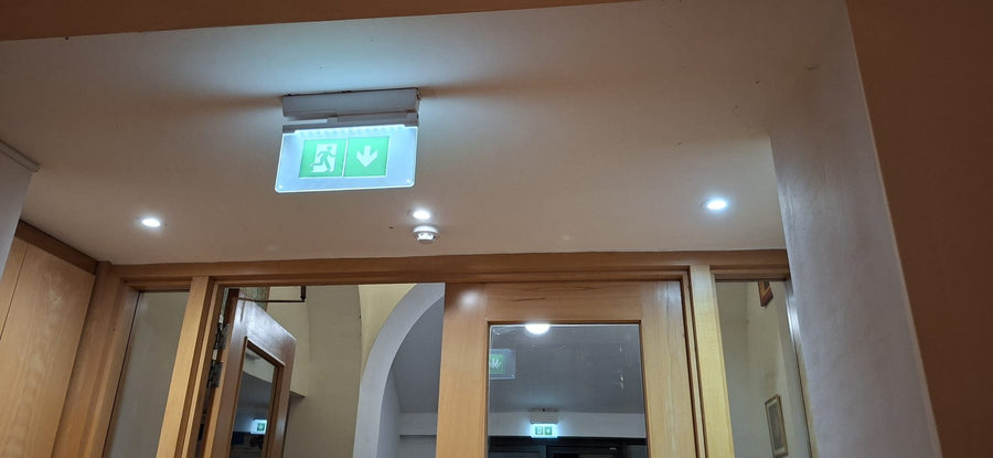 Downlights above the entrance doors