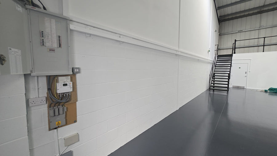 Distribution board and meter installed with trunking along the wall