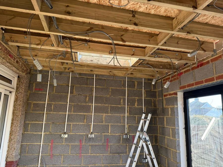 Cable drops and back boxes set out on the new blockwork