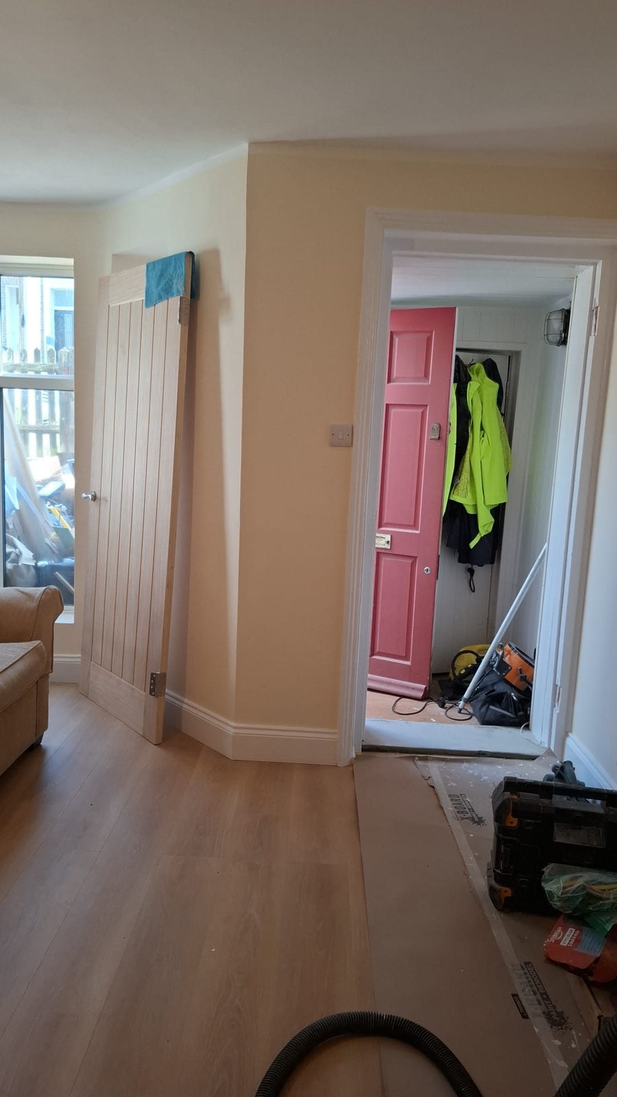 Hallway with new doors and wood-effect flooring