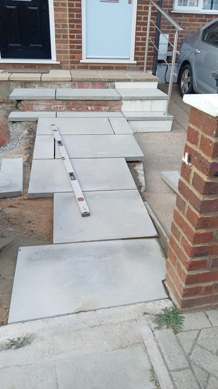 New paving slabs and steps up to the front door