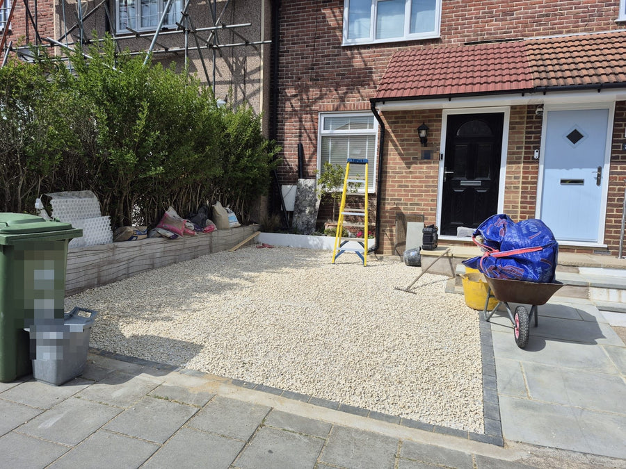 Gravel laid inside the new block edging