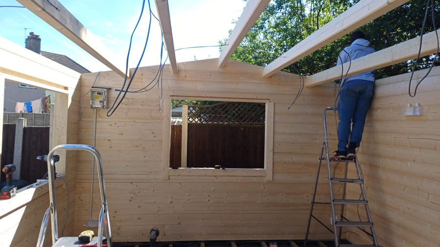 Running cables through the roof frame