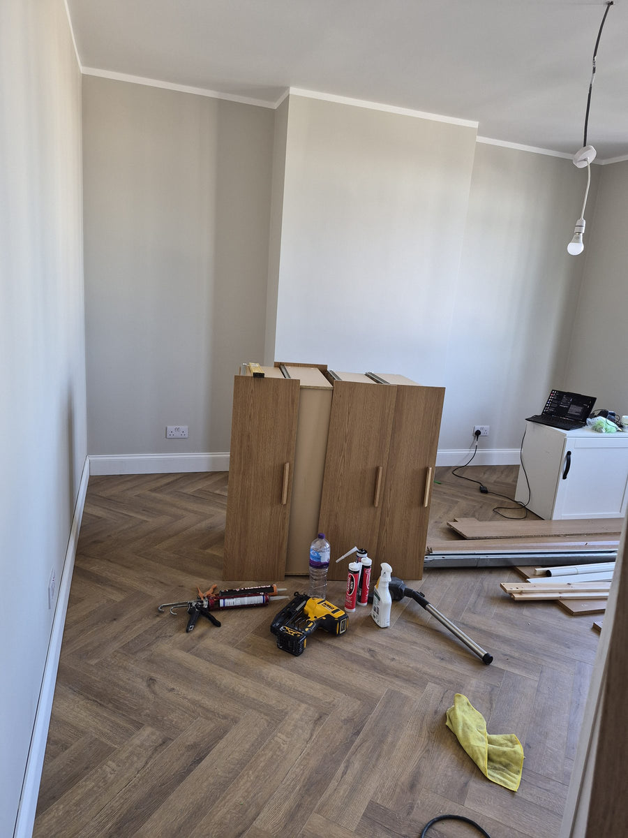 Herringbone floor and skirting finished in a bedroom
