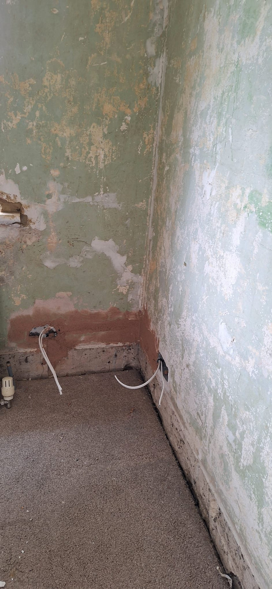 New cables brought out at socket positions in an old wall