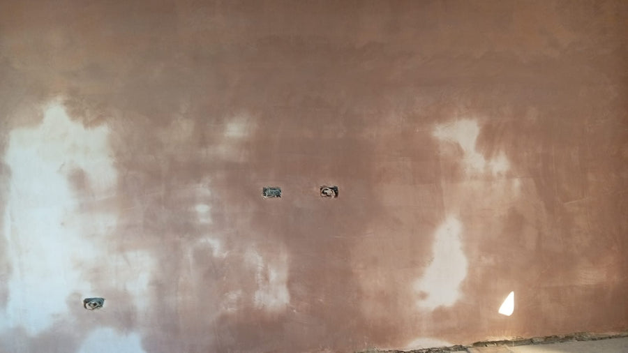 New socket back boxes in a freshly plastered wall