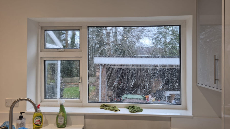 The finished kitchen sink below the window