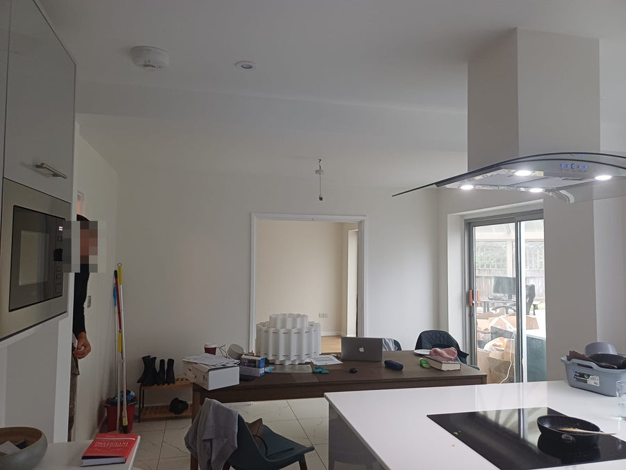 The island hob and built-in oven, looking towards the garden doors