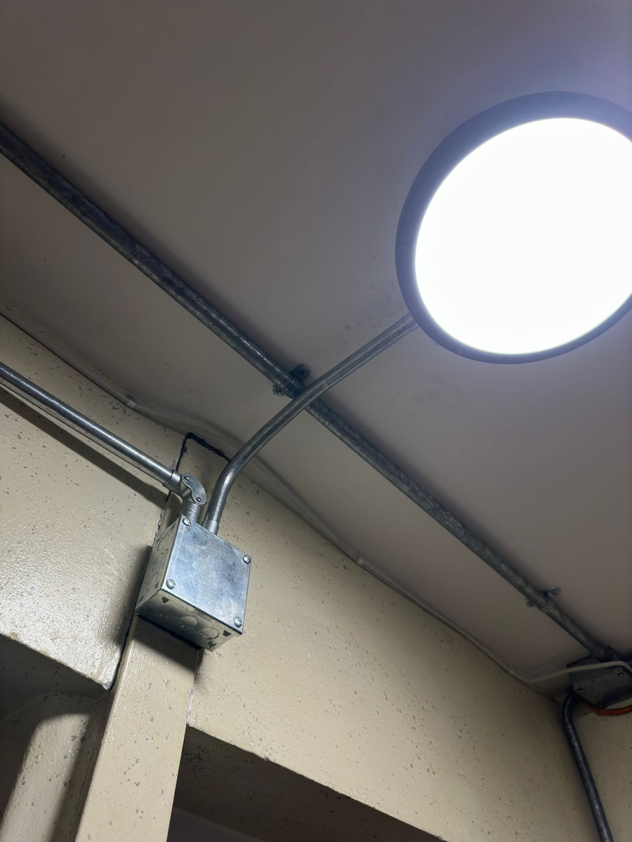 LED bulkhead light fed through galvanised conduit