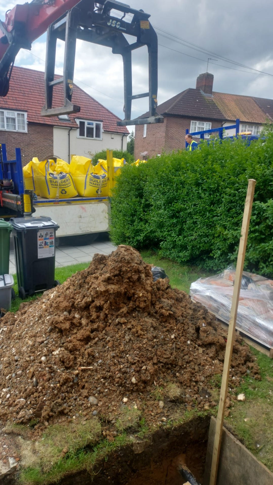 Digging out the foundations, with materials delivered to site