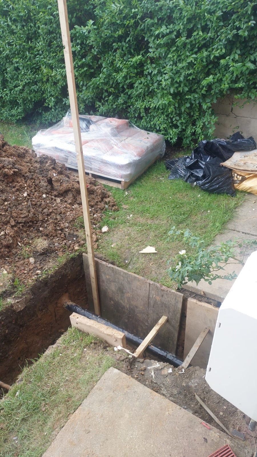 Timber shuttering in the foundation trench