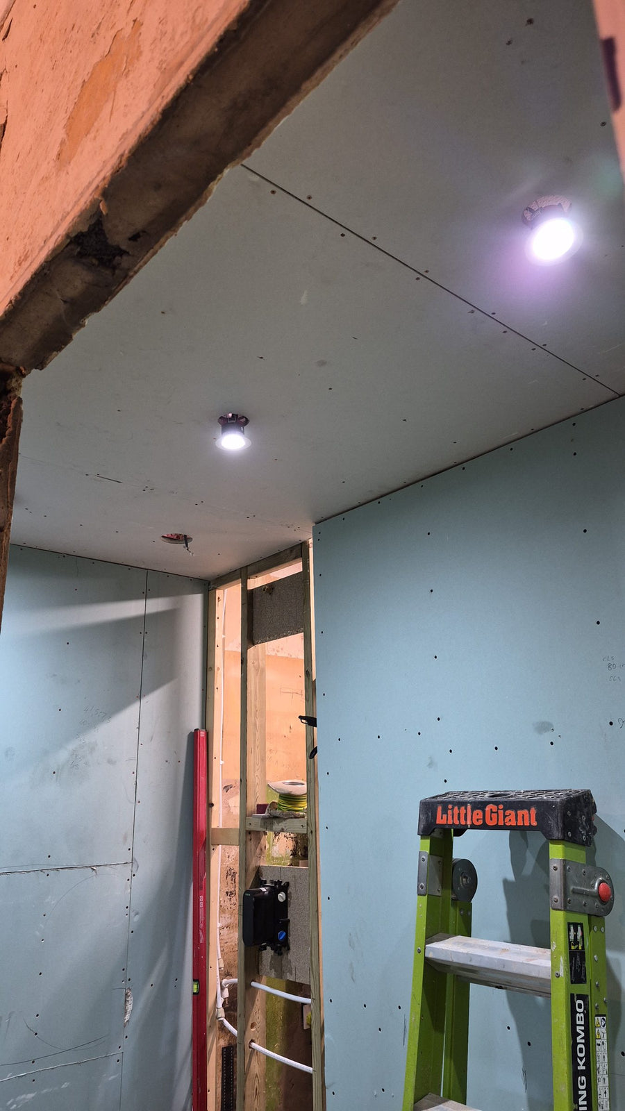 New ceiling with LED downlights, and the shower valve set into the stud wall