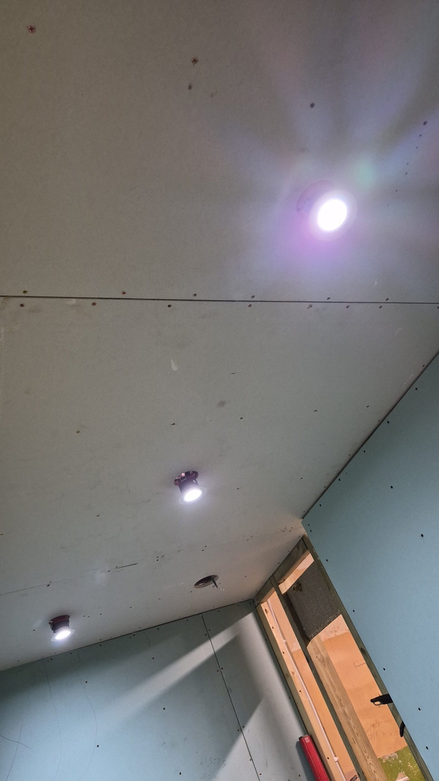LED downlights spaced across the new ceiling