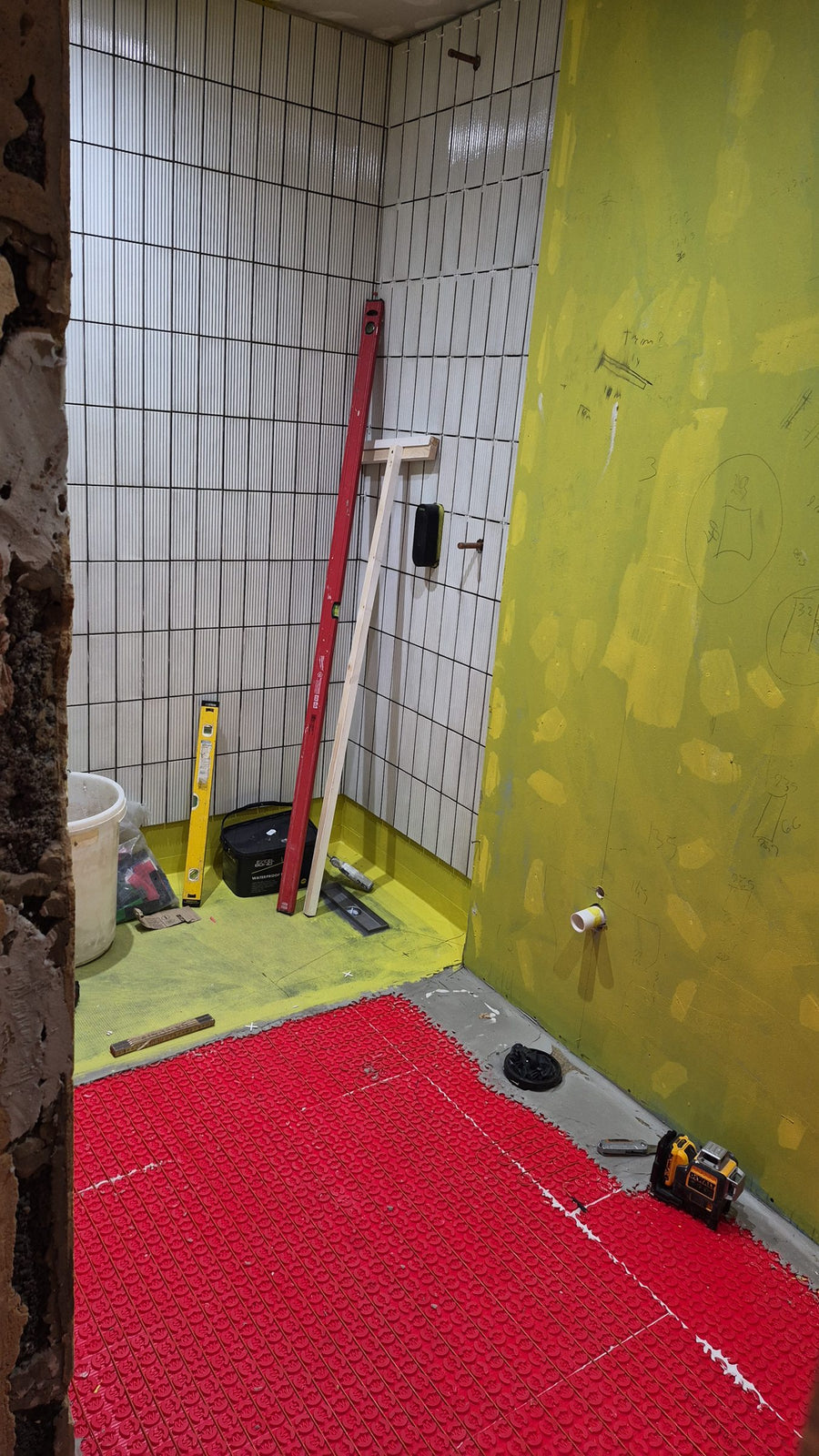 Electric underfloor heating laid across the floor